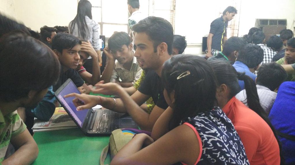 Chirag and Sonal teaching to code