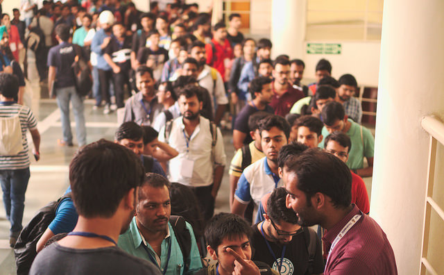 People waiting eagerly to grab awesome PyCon India 2016 t-shirt