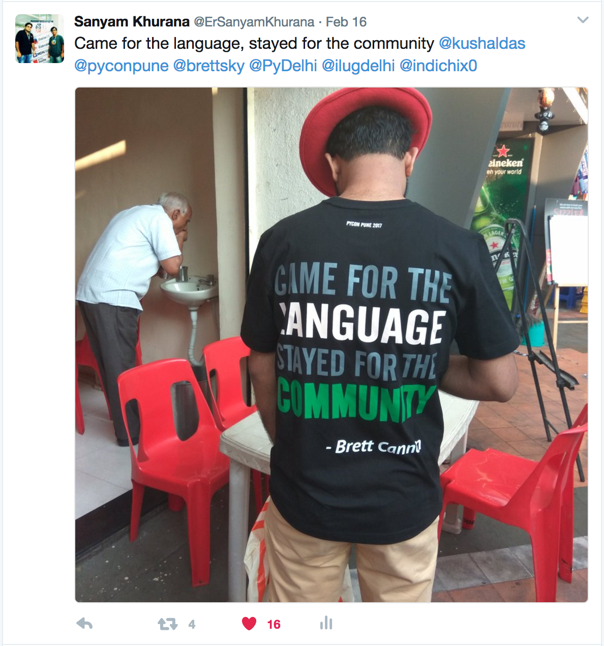 Kushal wearing the official PyCon Pune t-shirt